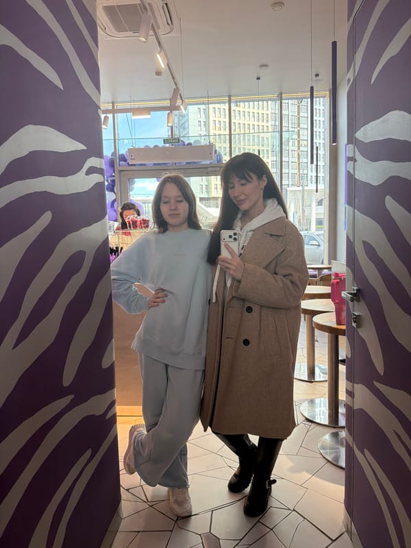 Young people socialize at purple-striped cafe in Perm, Russia