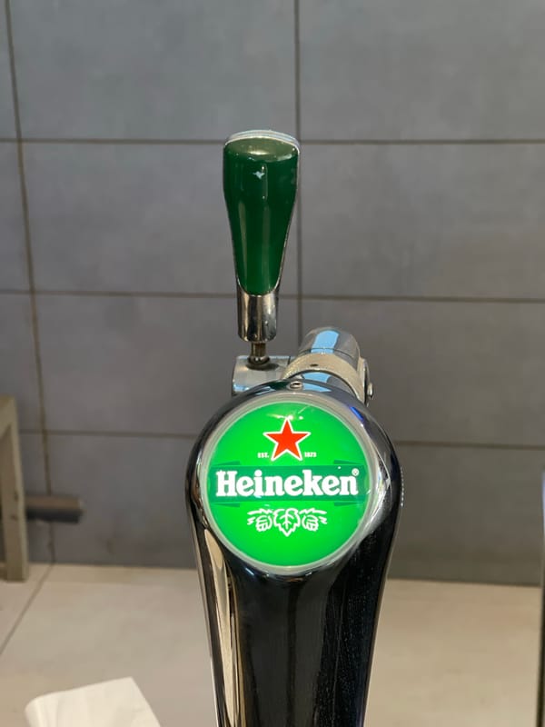 Casual afternoon drinks captured at Abuja bar establishment