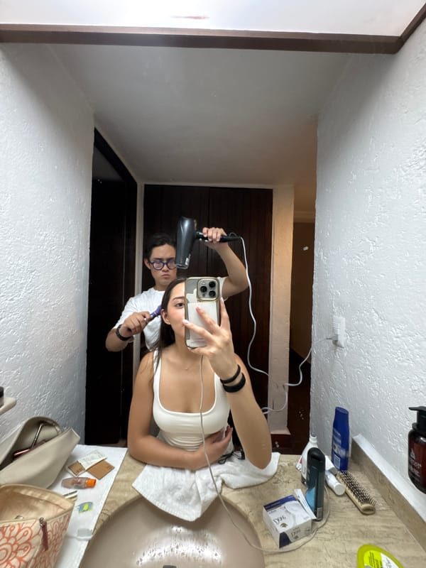 Woman takes mirror selfie in Cocoyoc bathroom