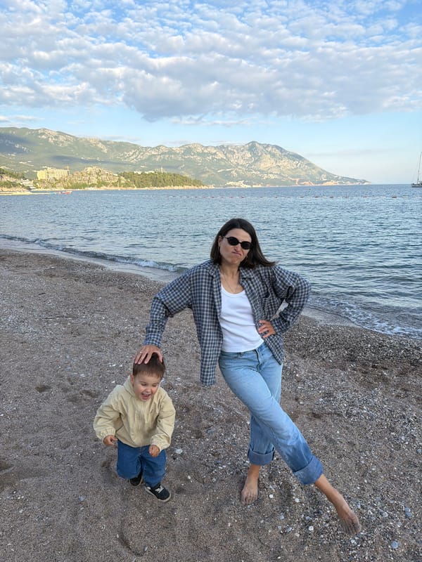 Mother and child enjoy beach time in Budva