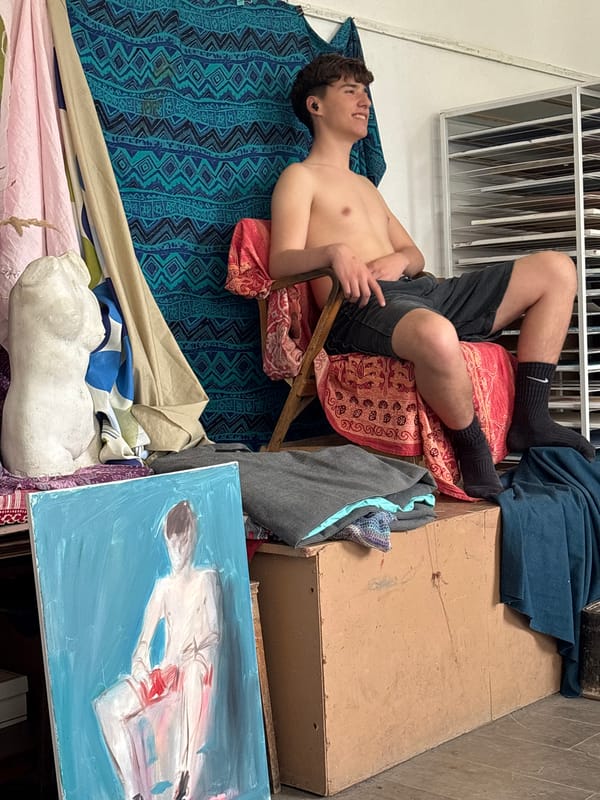 Artist captures reclining figure model in Troyan studio session