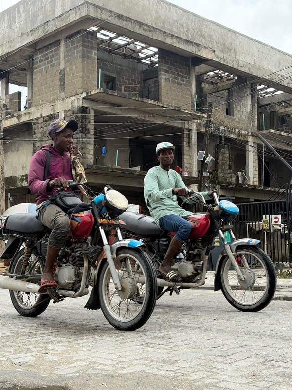 Everyday street life on a wet afternoon in Igboefon