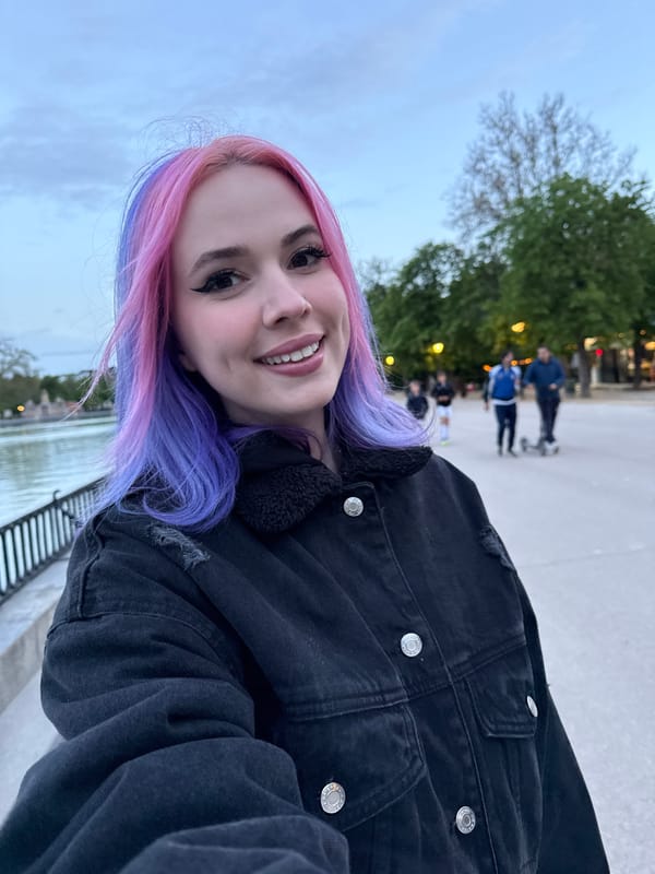Woman poses for photos at Madrid's El Retiro Park