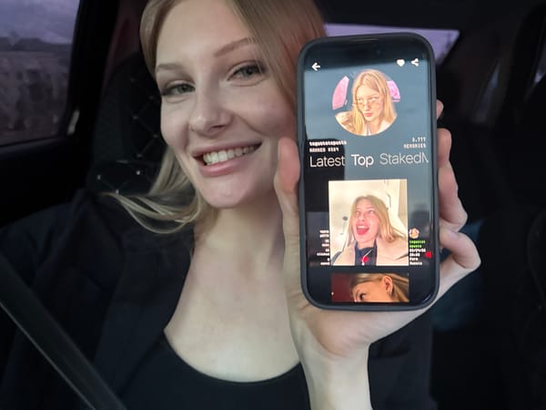 Woman reviews social media profile in car in Perm