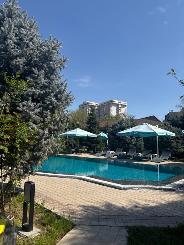 Hotel pool area documented in Tashkent during morning hours