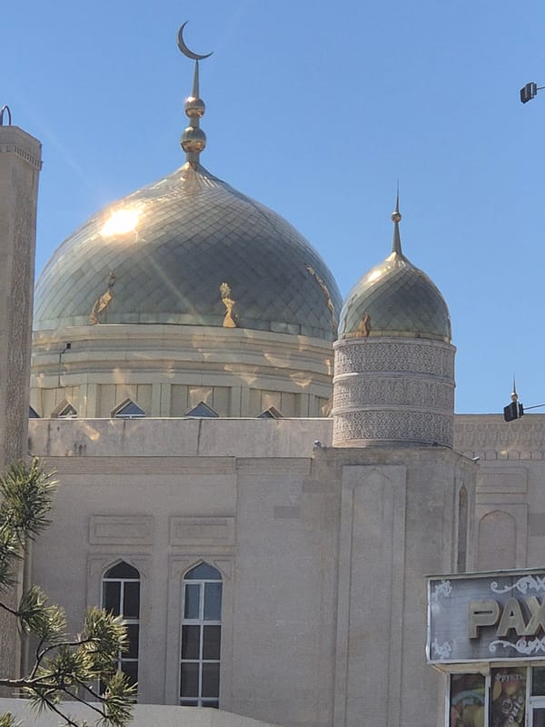 Golden domes of Nauryz Mosque photographed in Kokshetau