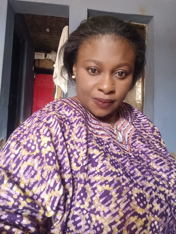 Woman photographed in kitchen setting in Jos, Nigeria