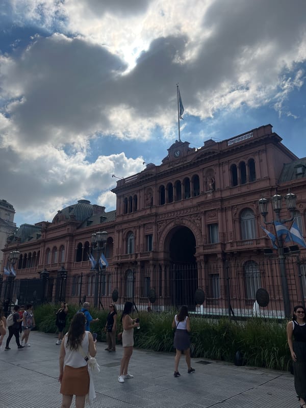 People queue at Buenos Aires Metropolitan Cathedral with clergy present
