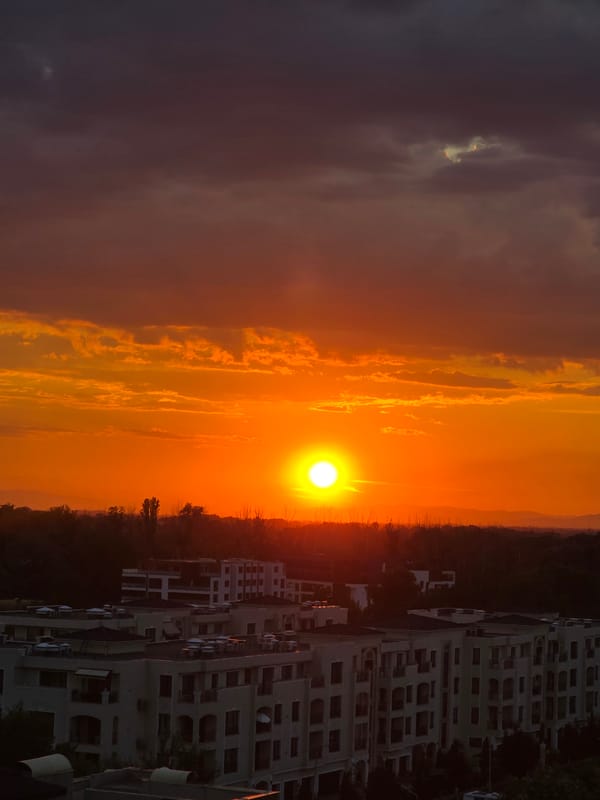 Sunset over Plovdiv, sky burning orange above the city