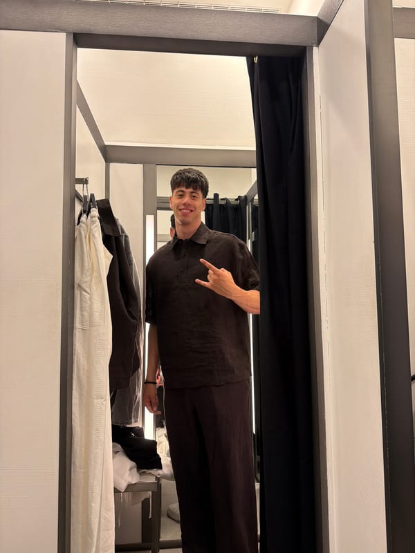 Man tries on clothes in Burgas fitting room