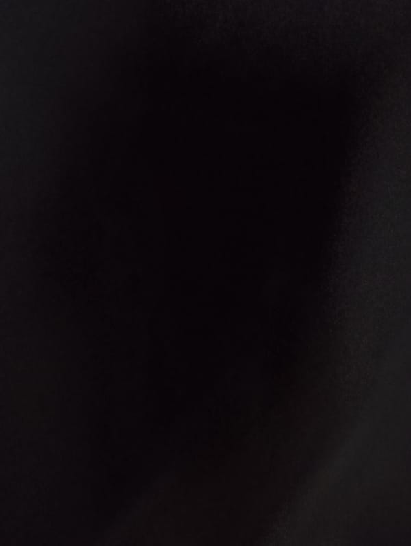 Dark indoor photos show textured surface, bright LED light