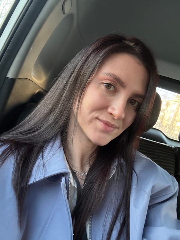 Woman takes selfie in car in Kazan, Russia