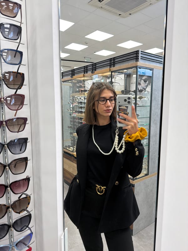 A low-key Sofia morning: optical shop, coffee, city streets.