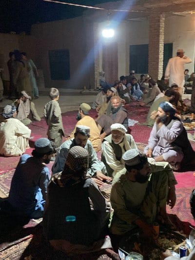 Traditional communal meal gathering held in Dehkheshk, Afghanistan