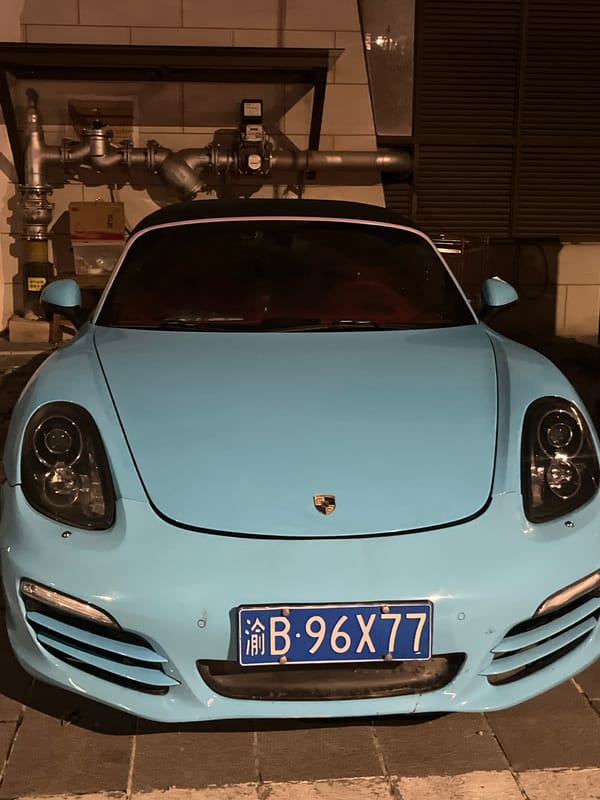 Nighttime street scenes and parked vehicles documented in Jiulongpo District