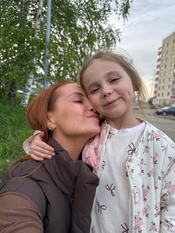 Woman and girl walk corgi, take selfies in Chaikovsky