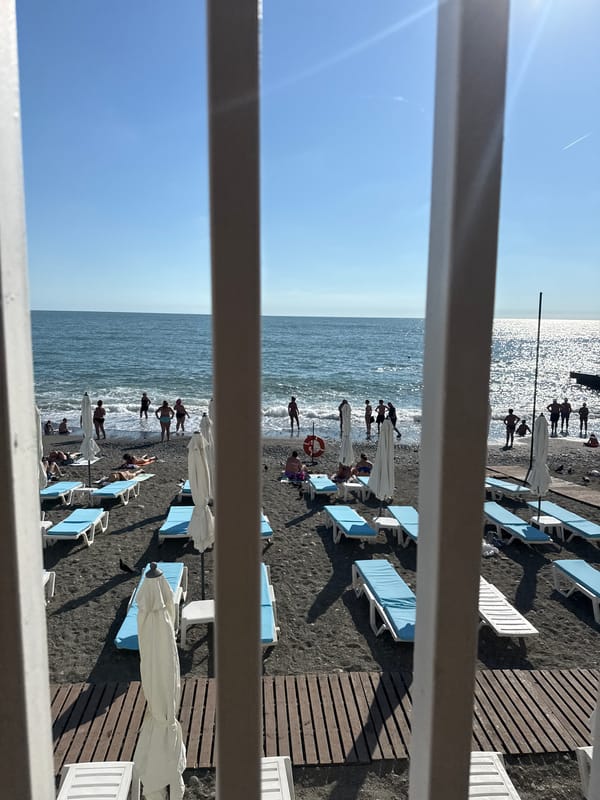 A quiet summer afternoon across Sochi's beach and gardens