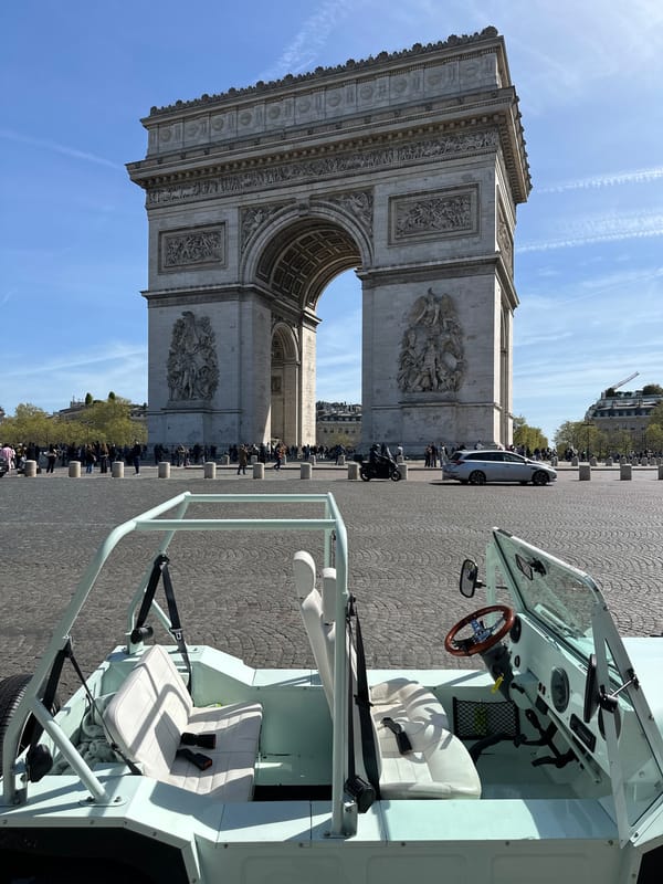 Blue convertible spotted at Paris Arc de Triomphe