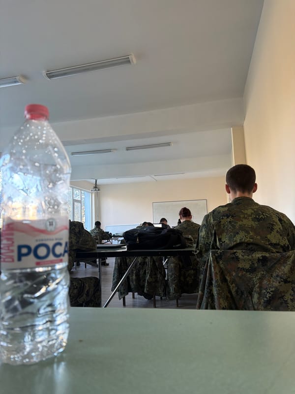 Military personnel gather in classroom setting in Bulgarian town