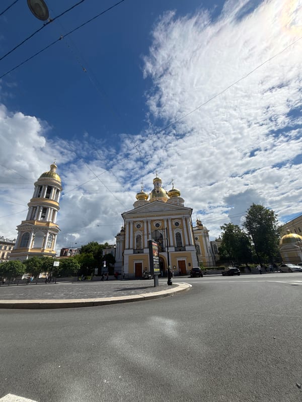 City morning near golden-domed churches with quirky street details
