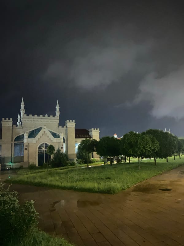 Gothic castle venue lit up at night in eastern Moscow
