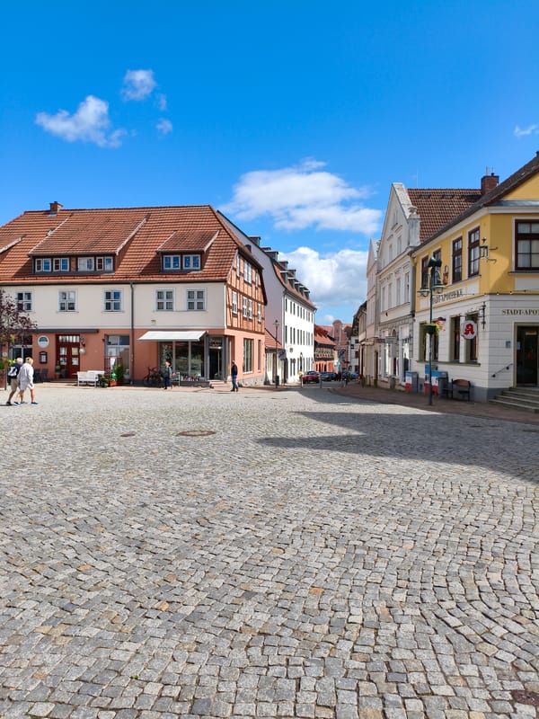 Strolling through a historic European cobblestone town center