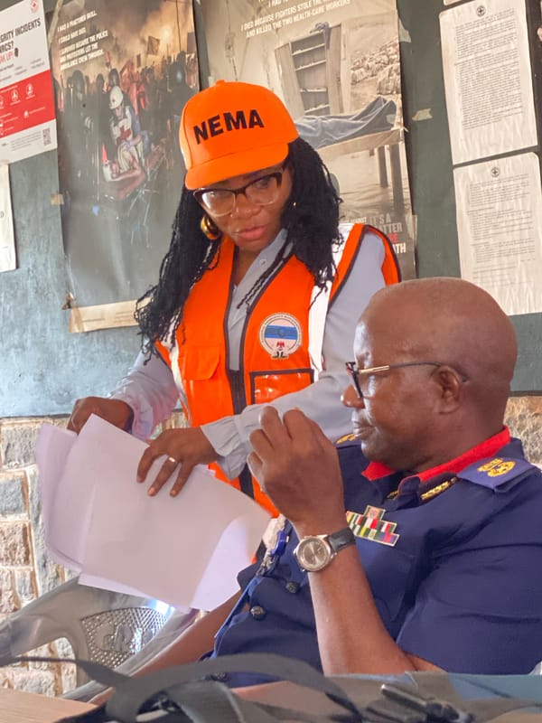 NEMA official meets with local resident in Nigeria