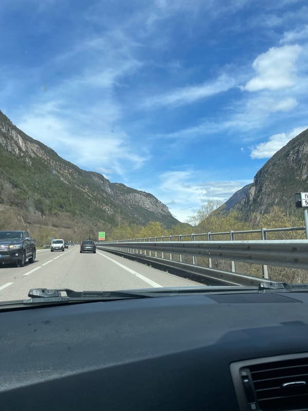 Highway traffic through Italian mountain region near Ospitale di Cadore