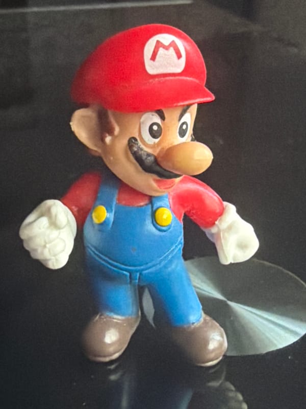 Nintendo figurines and everyday objects on a Kennewick tabletop