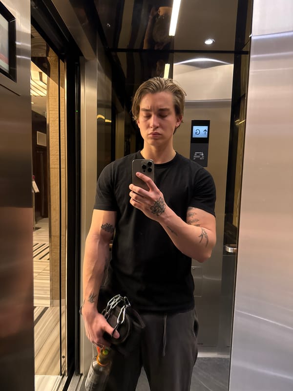 Young man takes mirror selfies in London elevator and gym