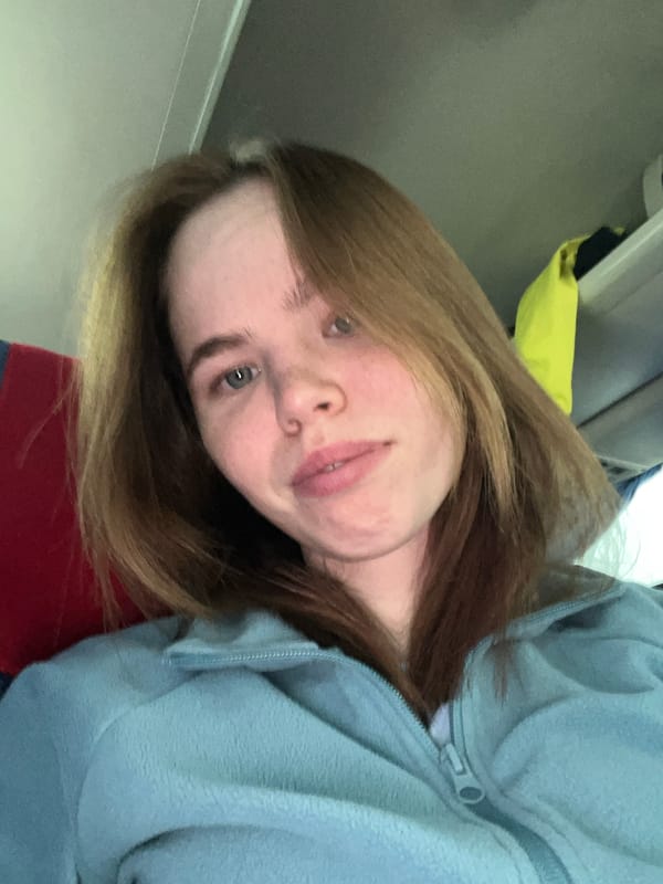 Woman takes selfie indoors in Perm, Russia