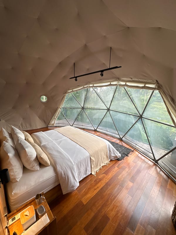 Geodesic glamping domes documented in tropical Licin, Indonesia