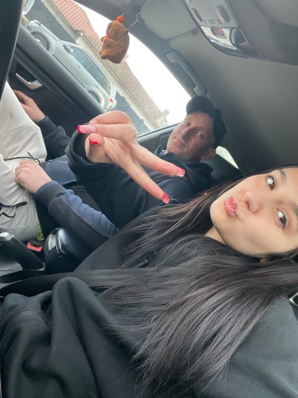 Couple takes playful selfie inside car in Kavarna