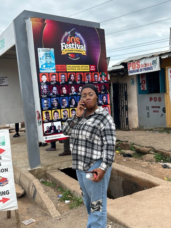 Everyday life on a busy market street in Jos, Nigeria