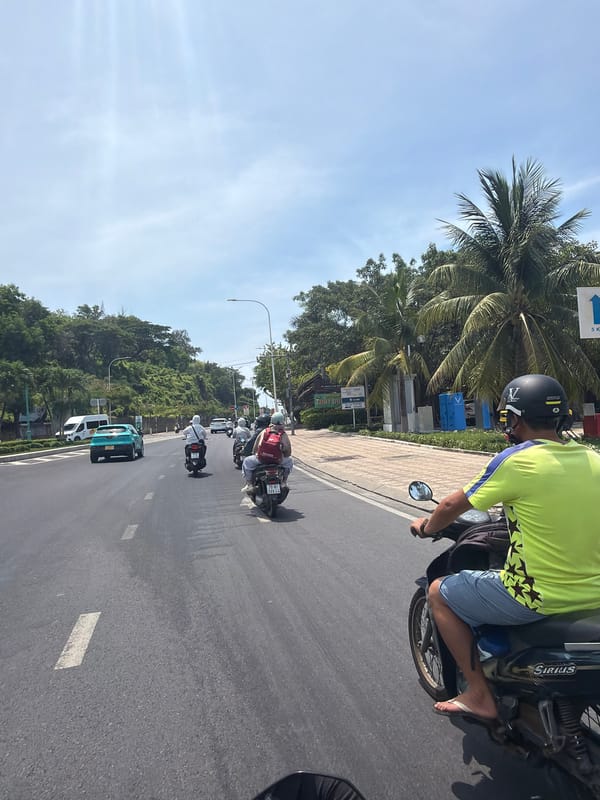 Morning motorcycle commute documented through Nha Trang streets