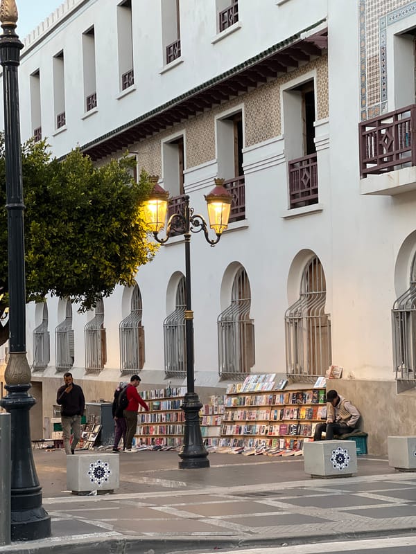 Evening pedestrian activity on Tangier's European-style street