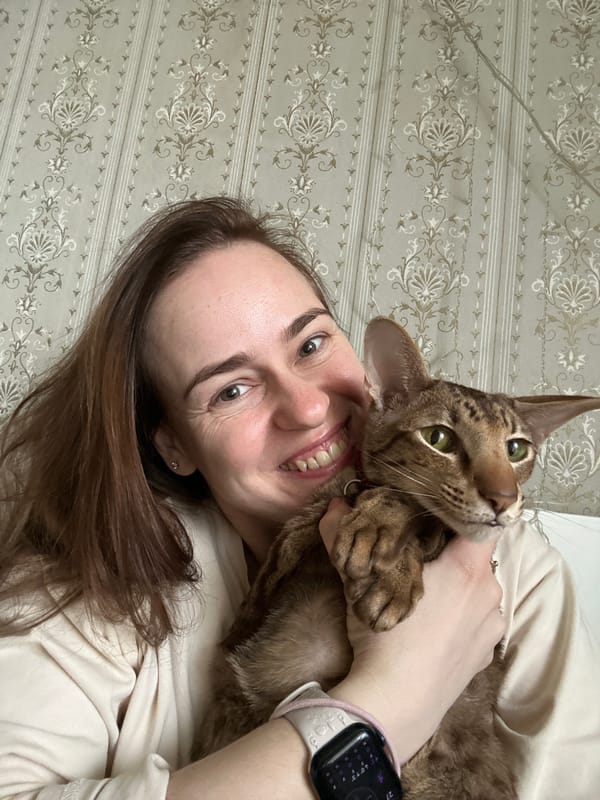 Moscow woman shares joyful moments with pet cat