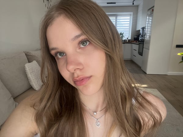 Woman takes playful selfies at home in Votkinsk