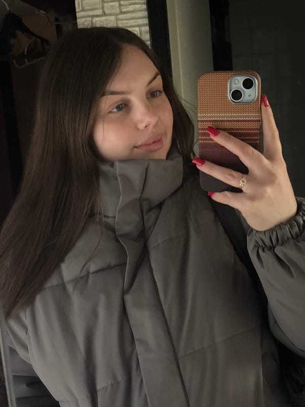 Woman takes selfie in Ukrainian rural settlement