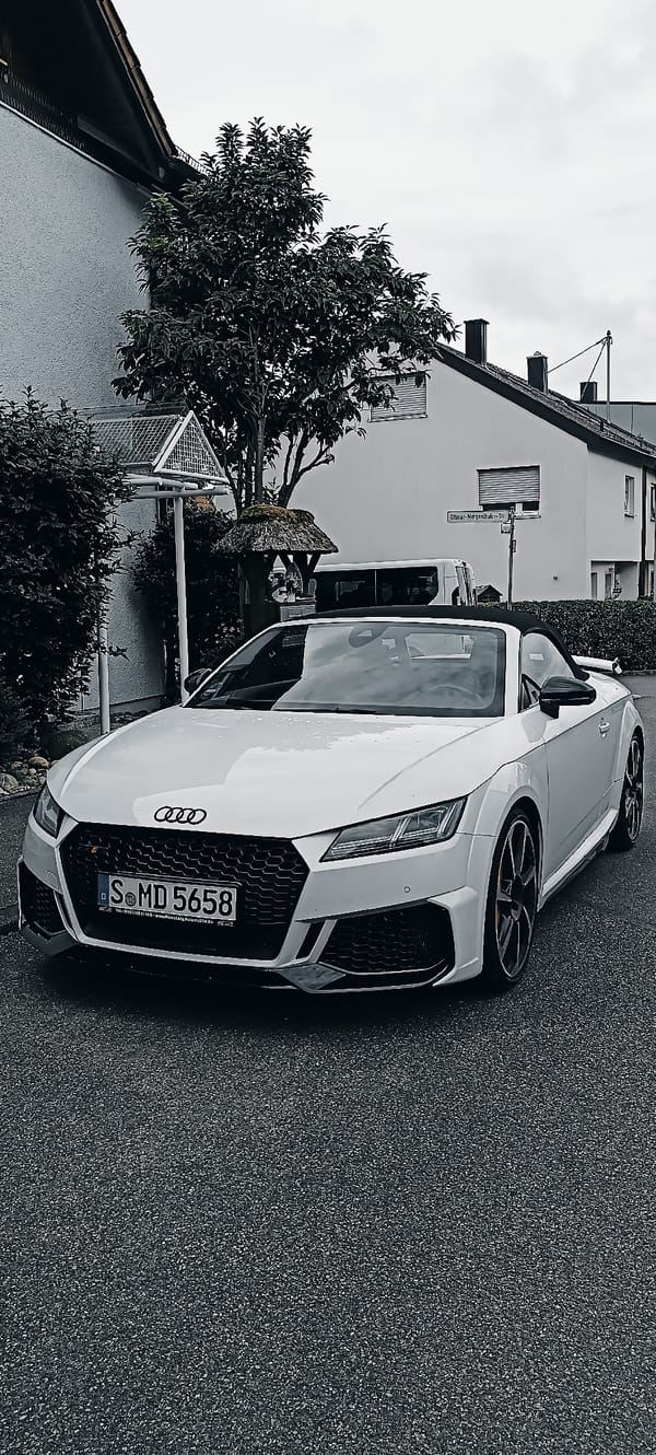Nautical garden display and parked convertible outside Waiblingen home