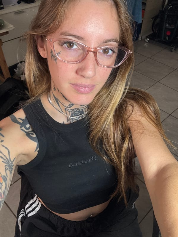 Woman takes selfies in Cordoba wearing distinctive outfit