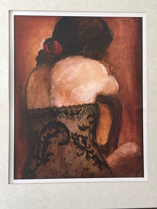 Framed artwork of reclining woman observed in Ocean City