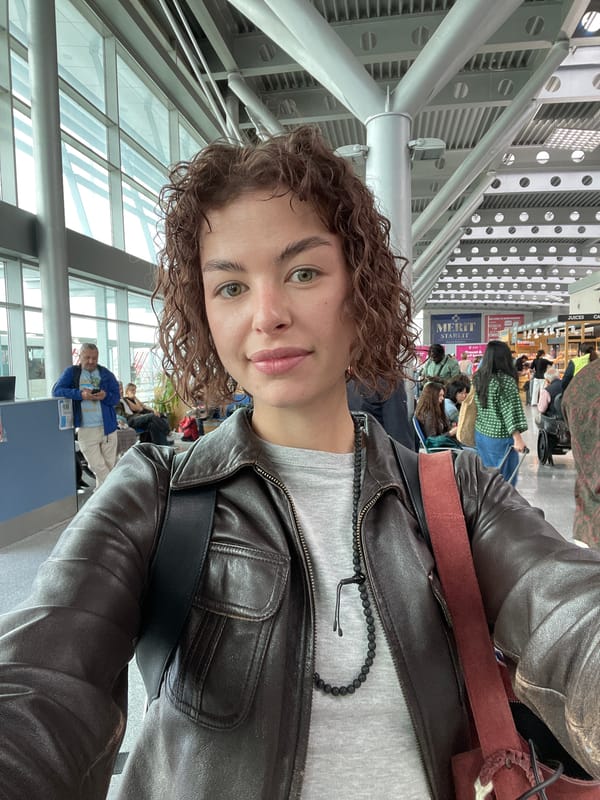 Person takes selfie at apparent airport in Podgorica