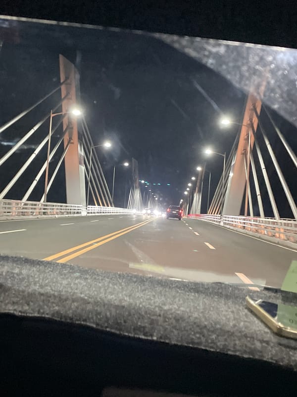 Night traffic recorded on illuminated bridge in Davao City