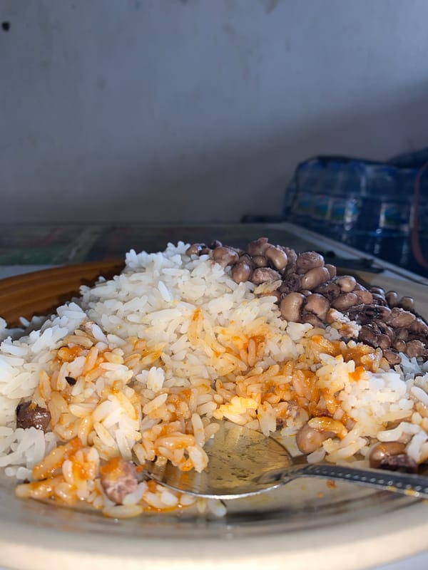Traditional rice and beans meal documented in New Stadium