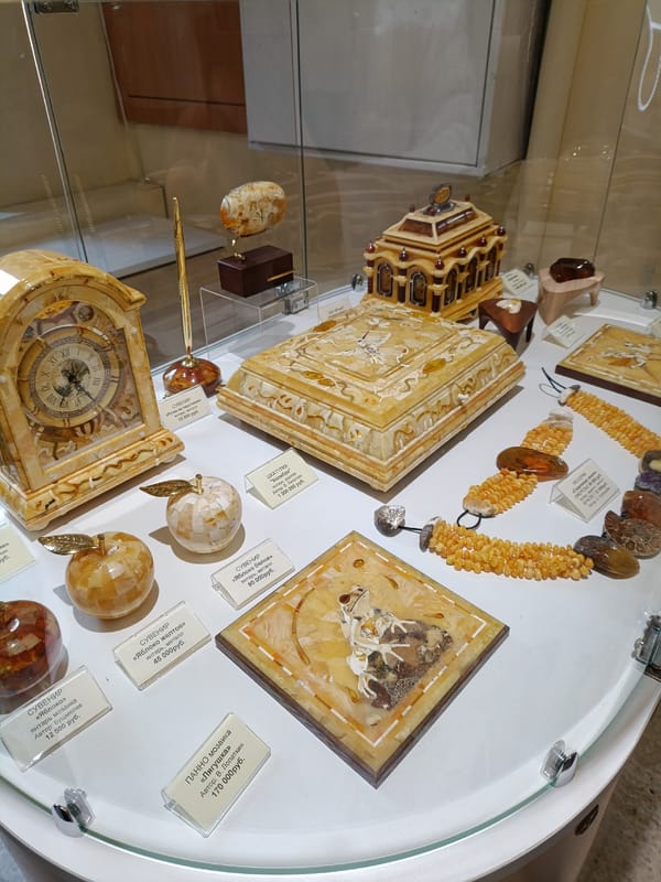 Tourist captures amber shop display and traditional figurine in Kaliningrad