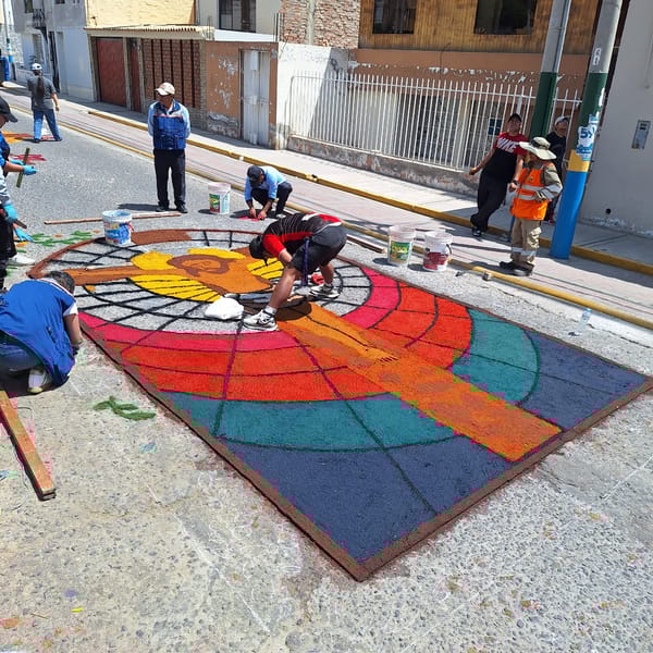 Community creates colorful sand street art in Peru