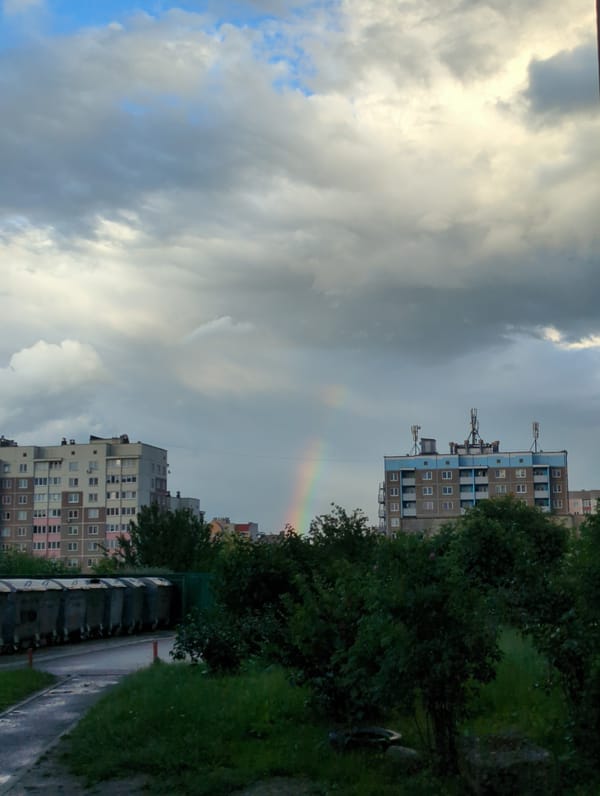 Rainbow over wet streets in Hrodna after summer rain