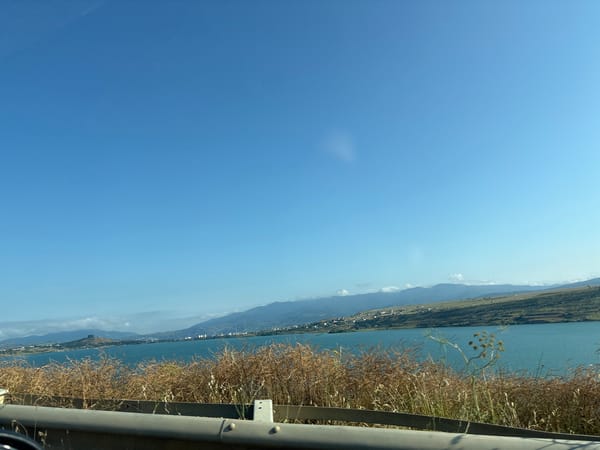 Driving the roads around Tbilisi Sea on a clear summer day