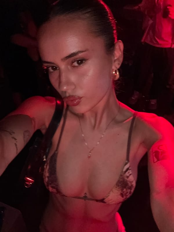 Red-lit pool party night in Żebbuġ, Malta